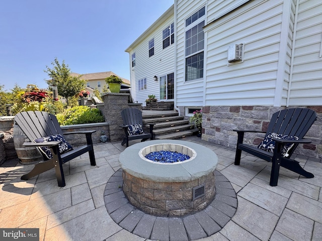 306 Rowland Ln, Line Lexington, PA 18932 - view of patio featuring a fire pit