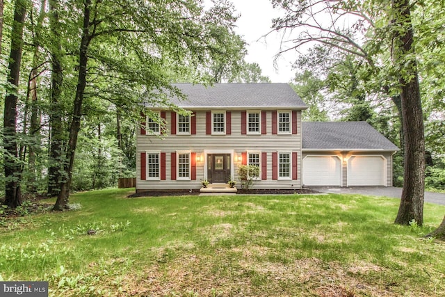 128 Azalea Dr, Hershey, PA 17033 - colonial inspired home with an attached garage, driveway, and a front yard