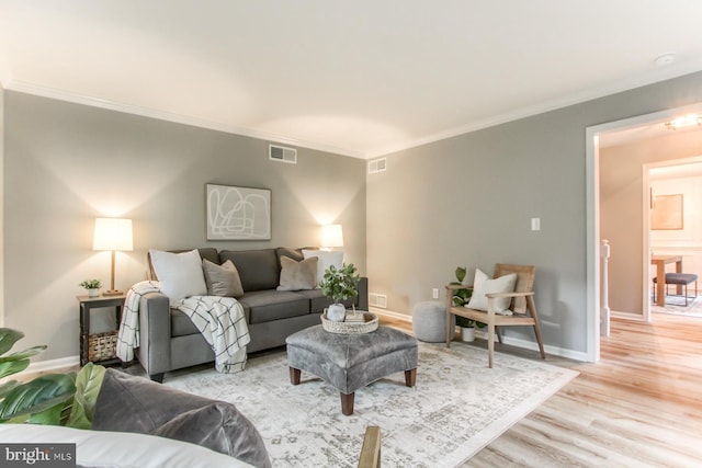 128 Azalea Dr, Hershey, PA 17033 - living area with light wood-style flooring and crown molding