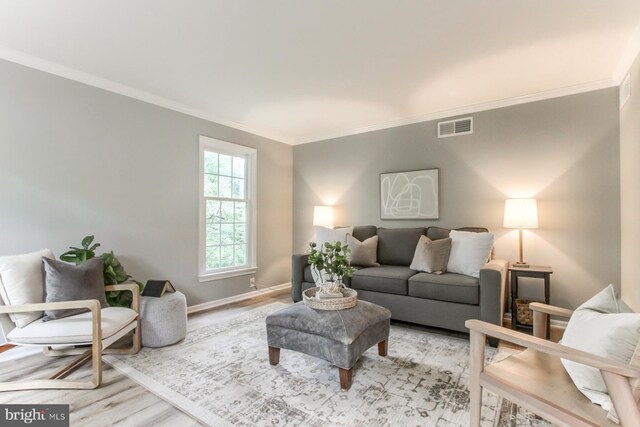 128 Azalea Dr, Hershey, PA 17033 - living area featuring ornamental molding and light wood finished floors