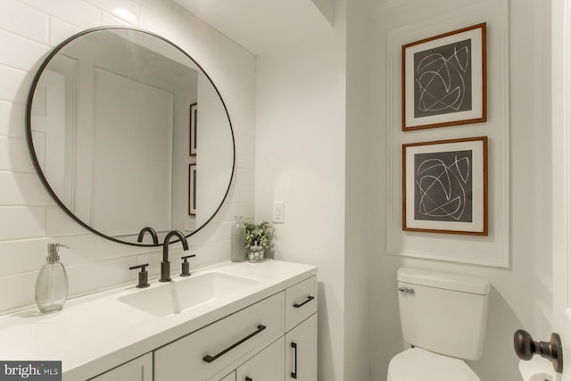 128 Azalea Dr, Hershey, PA 17033 - bathroom featuring vanity and decorative backsplash