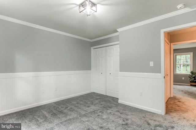 128 Azalea Dr, Hershey, PA 17033 - unfurnished bedroom featuring wainscoting, ornamental molding, carpet floors, and a closet