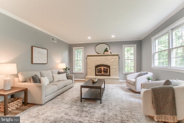 128 Azalea Dr, Hershey, PA 17033 - living area with ornamental molding, recessed lighting, a fireplace, and wood finished floors