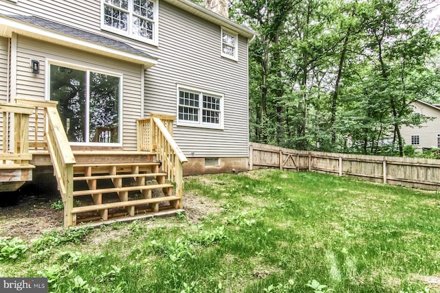 128 Azalea Dr, Hershey, PA 17033 - rear view of house with a fenced backyard, a wooden deck, and roof with shingles