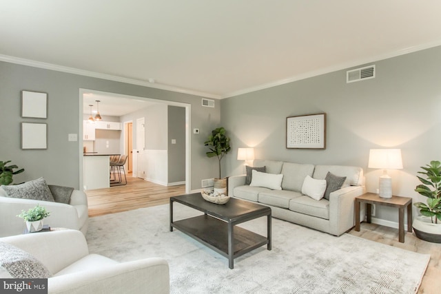 128 Azalea Dr, Hershey, PA 17033 - living area featuring ornamental molding and light wood-style floors