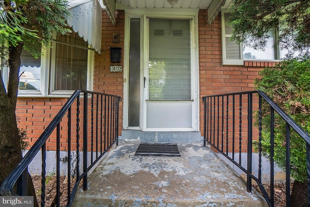 1402 Lehigh St, Allentown, PA 18103 - view of exterior entry featuring brick siding