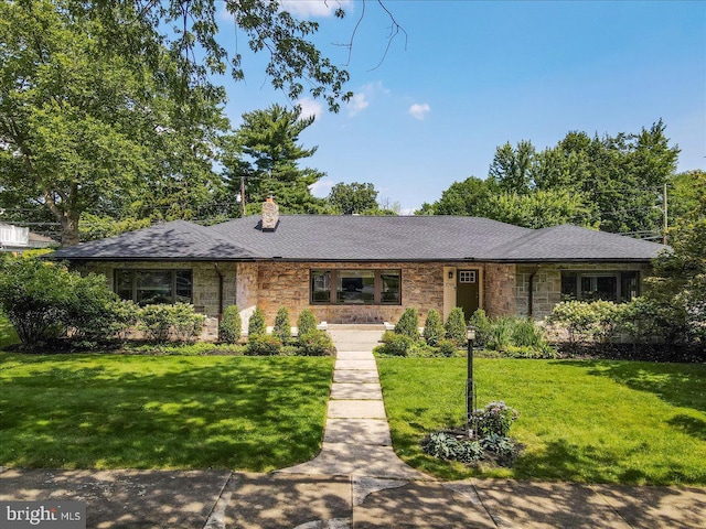 2705 W Gordon, Allentown, PA 18104 - ranch-style house featuring a front yard, a chimney, and stone siding