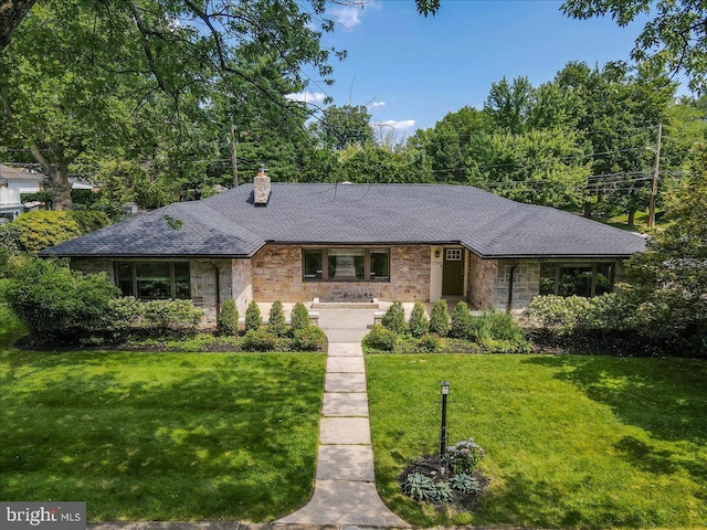 2705 W Gordon, Allentown, PA 18104 - view of front facade with a front lawn, a chimney, stone siding, and roof with shingles