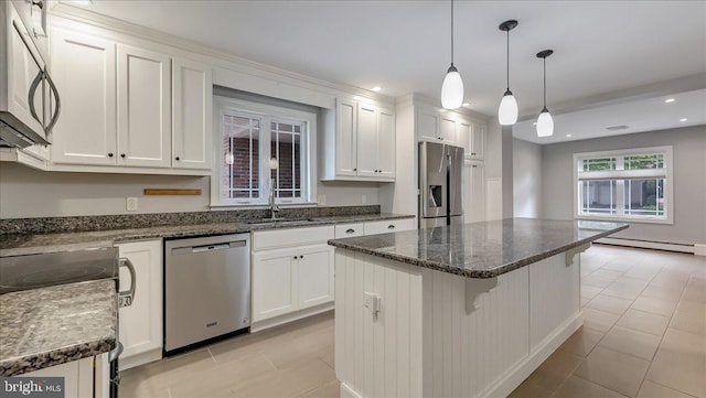 2705 W Gordon, Allentown, PA 18104 - kitchen featuring stainless steel appliances, a baseboard radiator, white cabinets, and recessed lighting