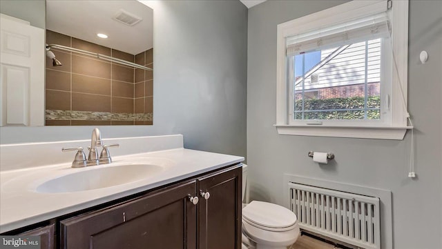 2705 W Gordon, Allentown, PA 18104 - bathroom with radiator, vanity, and a tile shower