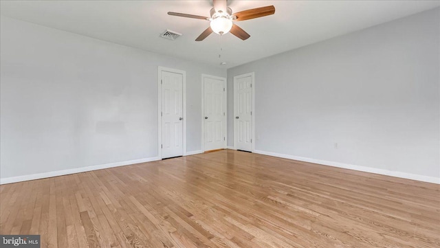 2705 W Gordon, Allentown, PA 18104 - unfurnished bedroom with light wood-style floors, multiple closets, and a ceiling fan