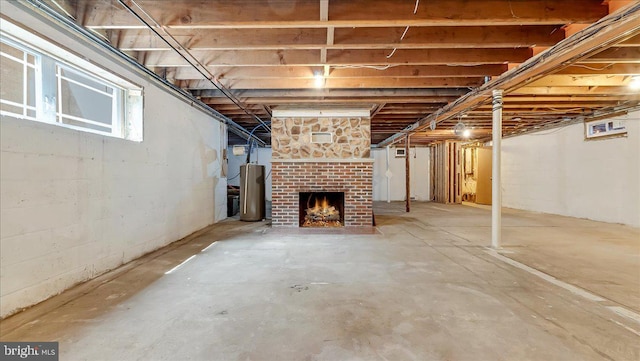2705 W Gordon, Allentown, PA 18104 - basement featuring a fireplace and gas water heater