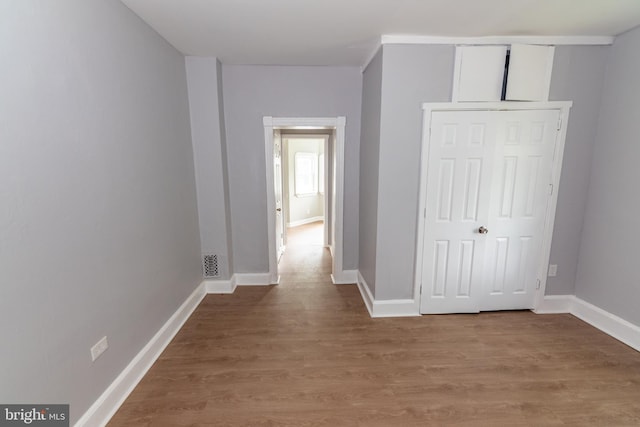 631 Saint Anns Ave, Baltimore, MD 21218 - hall featuring light wood-style floors