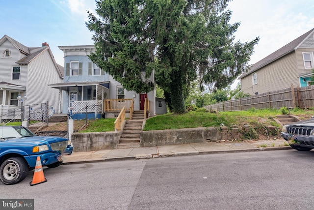 631 Saint Anns Ave, Baltimore, MD 21218 - view of front of home featuring covered porch and stairway