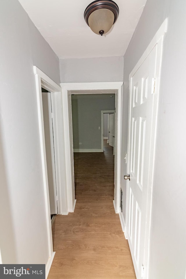631 Saint Anns Ave, Baltimore, MD 21218 - corridor with light wood-style floors