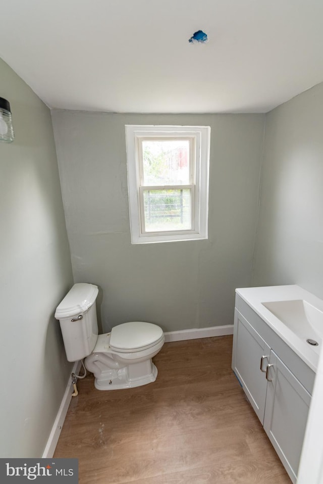 631 Saint Anns Ave, Baltimore, MD 21218 - bathroom with wood finished floors and vanity