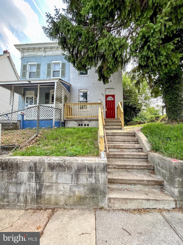 631 Saint Anns Ave, Baltimore, MD 21218 - view of front facade featuring covered porch