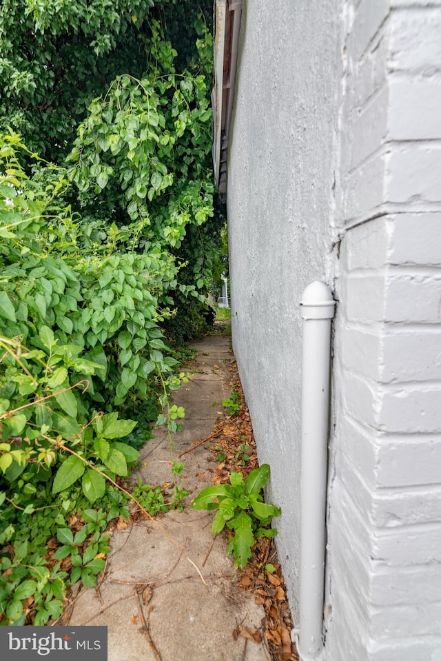 631 Saint Anns Ave, Baltimore, MD 21218 - exterior view of stucco siding