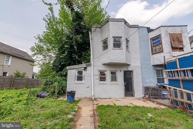 631 Saint Anns Ave, Baltimore, MD 21218 - rear view of house with brick siding