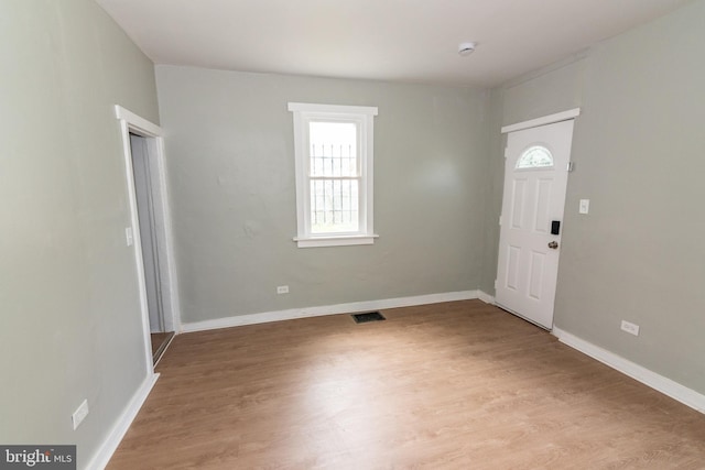 631 Saint Anns Ave, Baltimore, MD 21218 - entrance foyer featuring light wood-style floors and baseboards