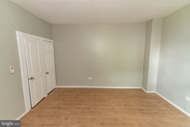 631 Saint Anns Ave, Baltimore, MD 21218 - empty room featuring light wood-style flooring and baseboards