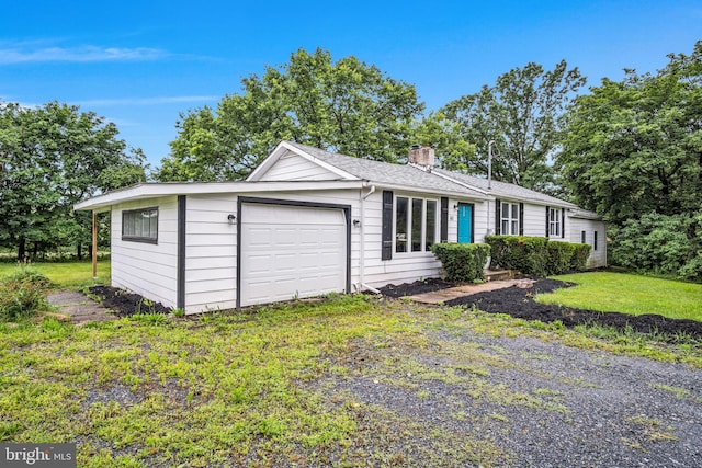 60 Gordon Dr, Carlisle, PA 17013 - ranch-style house with an attached garage, a chimney, and a front yard