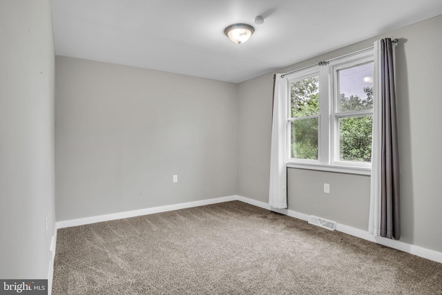60 Gordon Dr, Carlisle, PA 17013 - carpeted empty room with baseboards