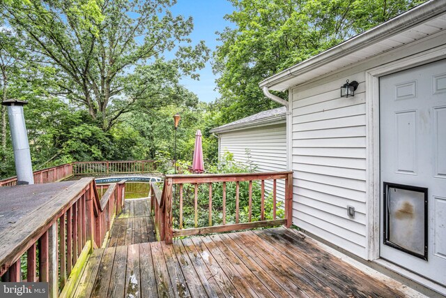 60 Gordon Dr, Carlisle, PA 17013 - deck featuring view of scattered trees