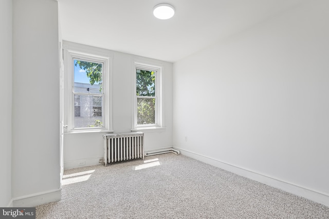 1439 S 28th St, Philadelphia, PA 19146 - carpeted spare room with radiator and baseboards