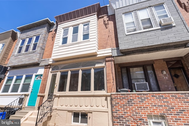 1439 S 28th St, Philadelphia, PA 19146 - view of side of home featuring entry steps, cooling unit, and brick siding