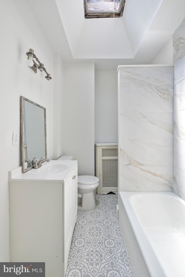 1439 S 28th St, Philadelphia, PA 19146 - bathroom with vanity, radiator, tile patterned flooring, and bathtub / shower combination