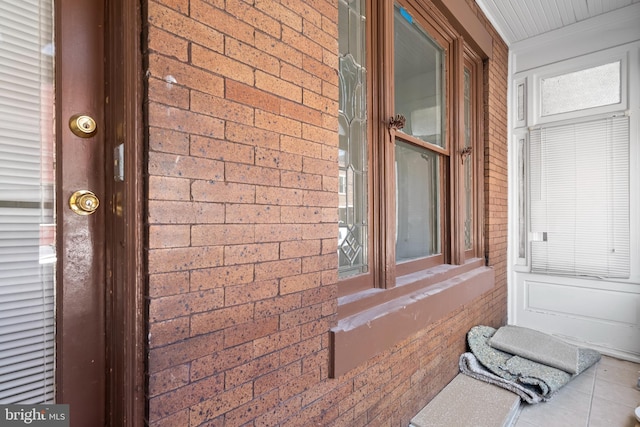1439 S 28th St, Philadelphia, PA 19146 - view of exterior entry with brick siding and a porch