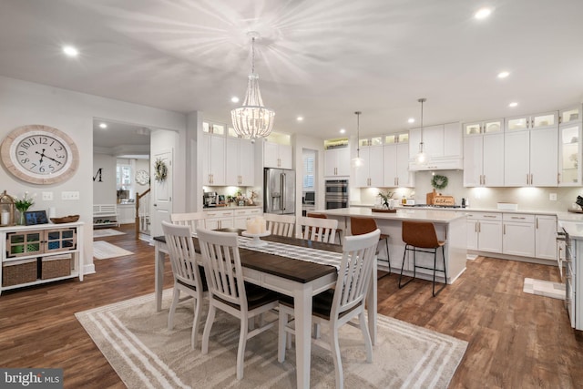 303 Petunia Way, Stafford, VA 22554 - dining space with recessed lighting, dark wood finished floors, and a chandelier