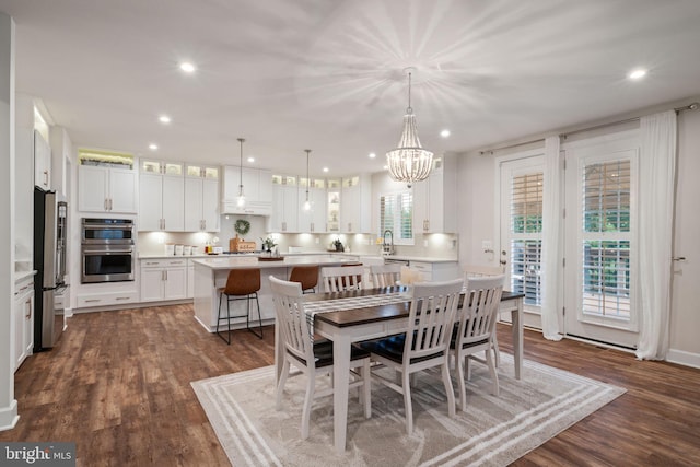 303 Petunia Way, Stafford, VA 22554 - dining space featuring a chandelier, recessed lighting, and dark wood-style flooring
