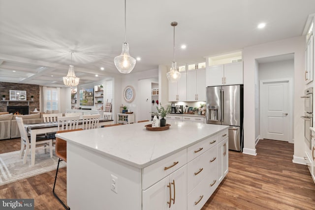 303 Petunia Way, Stafford, VA 22554 - kitchen with high end fridge, recessed lighting, a center island, white cabinetry, and a fireplace