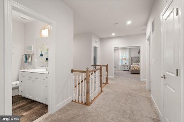 303 Petunia Way, Stafford, VA 22554 - corridor with an upstairs landing, recessed lighting, and carpet