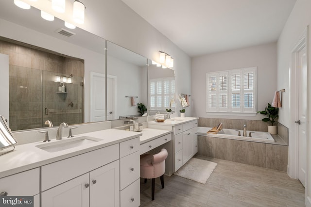 303 Petunia Way, Stafford, VA 22554 - full bath with vanity, a shower stall, and a bath
