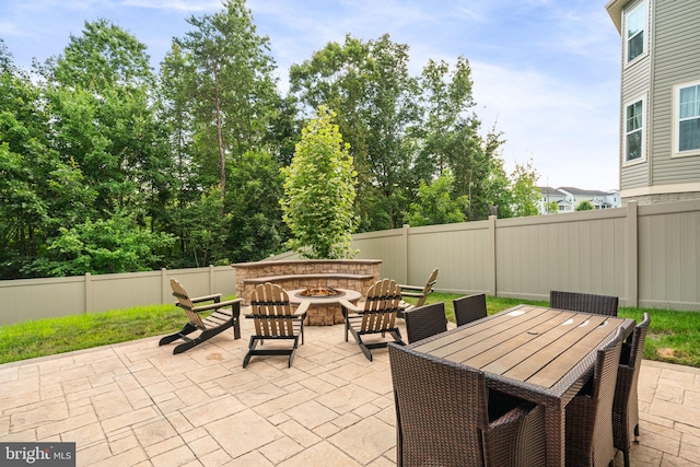 303 Petunia Way, Stafford, VA 22554 - fenced backyard featuring an outdoor fire pit and a patio