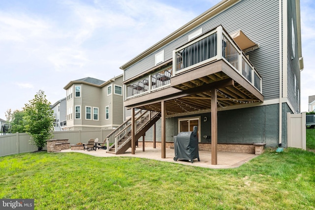 303 Petunia Way, Stafford, VA 22554 - back of property featuring an outdoor fire pit, a patio, stairs, and a deck