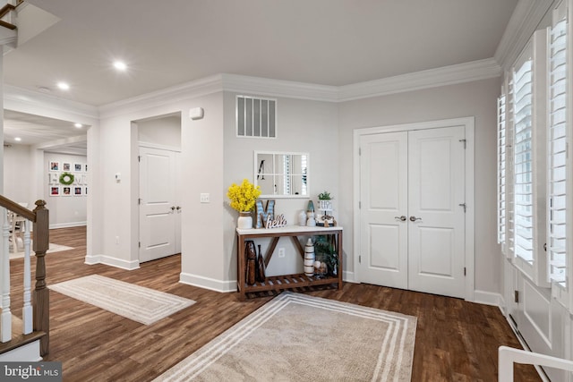 303 Petunia Way, Stafford, VA 22554 - foyer with wood finished floors, plenty of natural light, crown molding, recessed lighting, and stairway