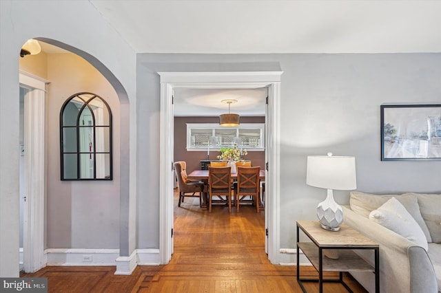 828 Turner Ave, Drexel Hill, PA 19026 - foyer entrance with arched walkways and hardwood / wood-style flooring