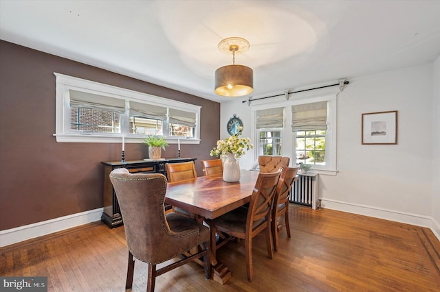 828 Turner Ave, Drexel Hill, PA 19026 - dining space featuring radiator and hardwood / wood-style floors