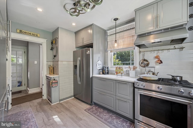 828 Turner Ave, Drexel Hill, PA 19026 - kitchen with gray cabinets, appliances with stainless steel finishes, healthy amount of natural light, under cabinet range hood, and recessed lighting
