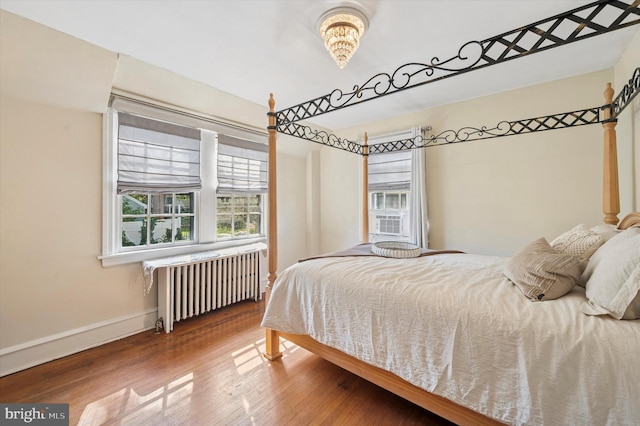 828 Turner Ave, Drexel Hill, PA 19026 - bedroom featuring radiator and wood finished floors