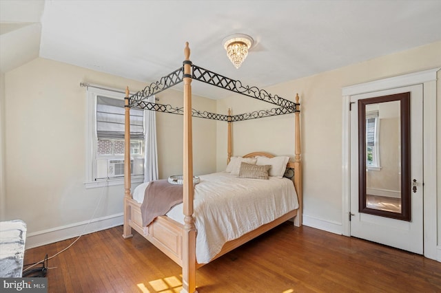 828 Turner Ave, Drexel Hill, PA 19026 - bedroom featuring wood finished floors, vaulted ceiling, and cooling unit