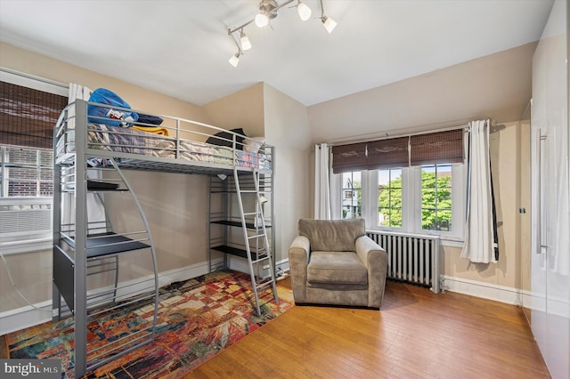 828 Turner Ave, Drexel Hill, PA 19026 - bedroom featuring wood finished floors and radiator heating unit
