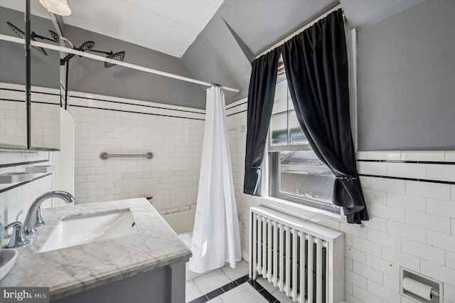 828 Turner Ave, Drexel Hill, PA 19026 - full bath featuring radiator heating unit, tile walls, shower / tub combo with curtain, vanity, and tile patterned floors