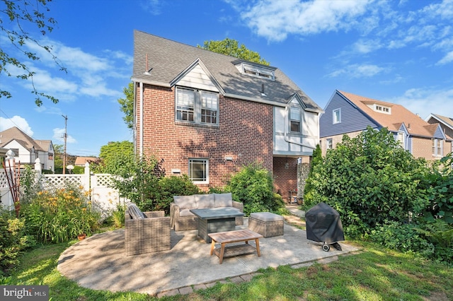 828 Turner Ave, Drexel Hill, PA 19026 - rear view of property with brick siding, a patio area, outdoor lounge area, and roof with shingles