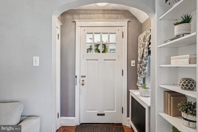 828 Turner Ave, Drexel Hill, PA 19026 - foyer featuring arched walkways and wood finished floors