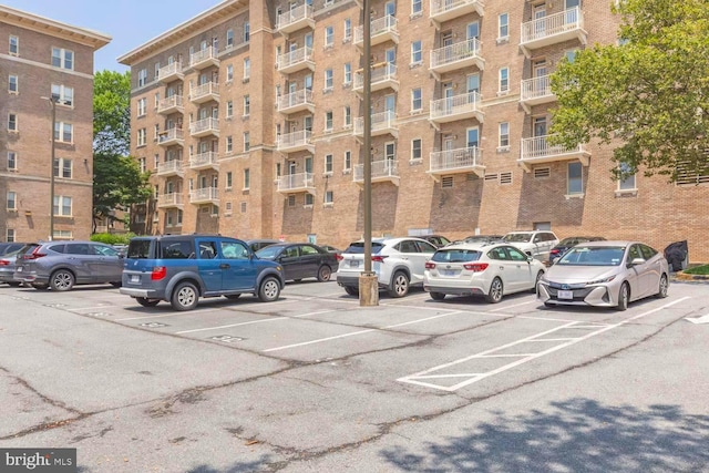 1308 Clifton St NW Unit 118, Washington, DC 20009 - view of apartment building / complex featuring uncovered parking